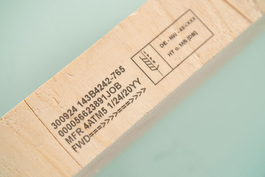 wood 2x4 with text date and graphic