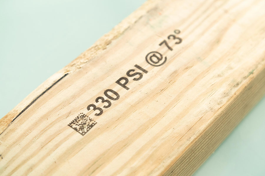 wood with QRcode text and numbers