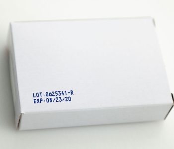 white box with blue ink. lot number and expiration date